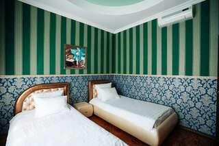 Гостиница Малибу Омск ПолуЛюкс двухместный с двумя односпальными кроватями-2